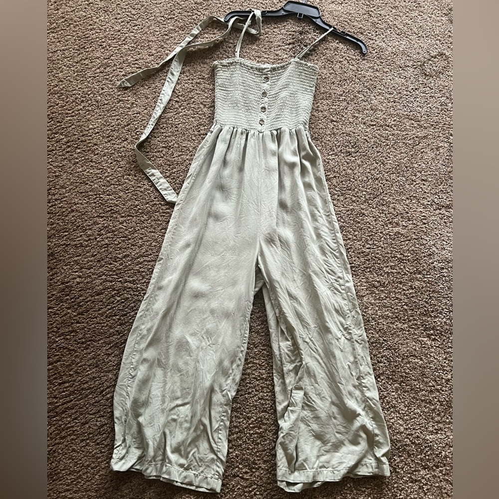 Sage green jumpsuit with tie around waist
